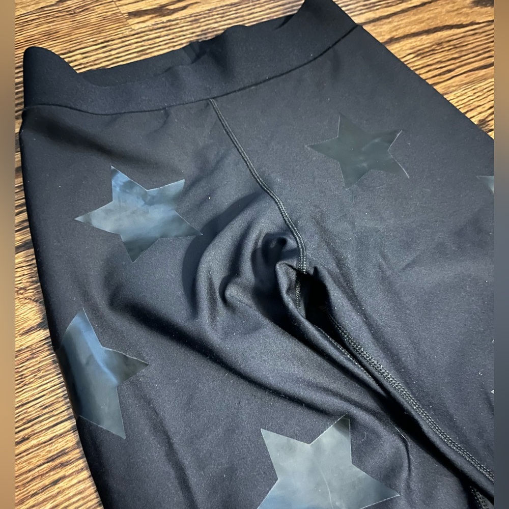 Ultracor size XS black leggings with star details - barely worn!